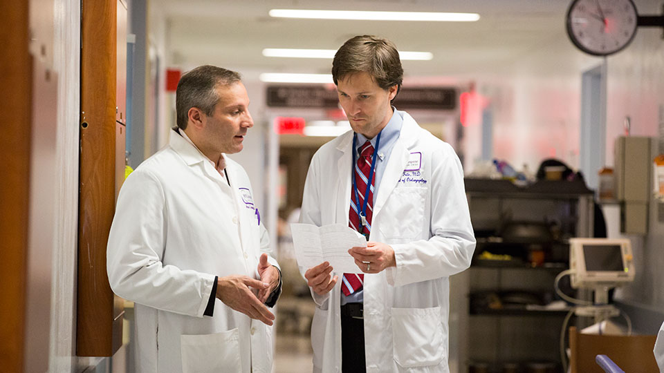Dr. Adam Jacobson and Colleague