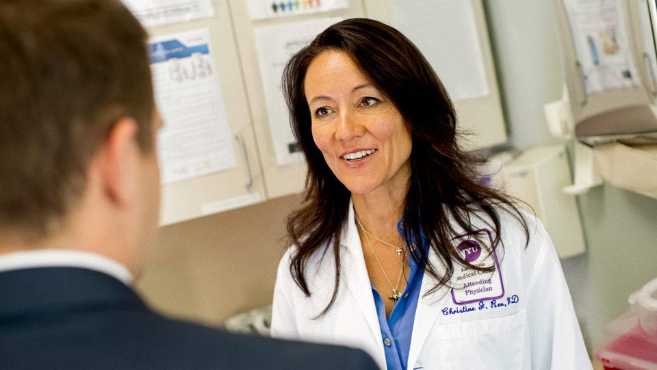 Dr. Christine Ren-Fielding Smiles at Patient