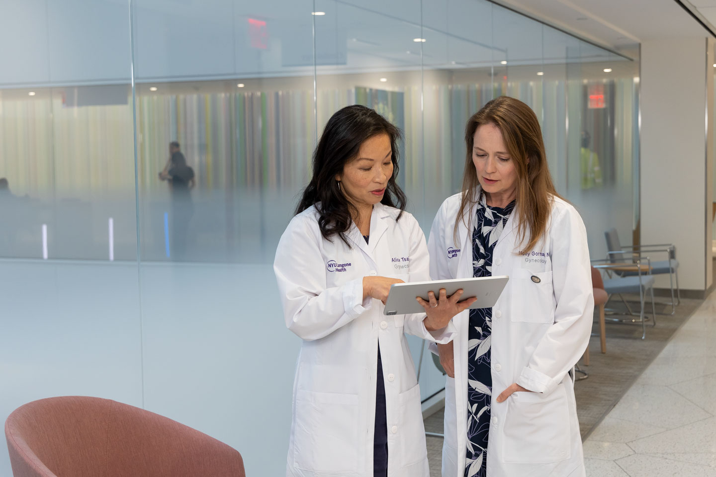 Dr. Alice K. Tsai and Nurse Practitioner Holly O. Gorman Talk While Looking at Tablet